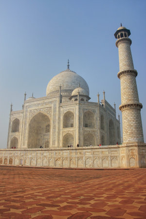 View of Taj Mahal in the morning, Agra, Uttar Pradesh, India. It was commissioned in 1632 by the Mughal emperor Shah Jahan to house the tomb of his favourite wife Mumtaz Mahal.の写真素材
