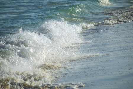 Close-up of the surf on Fayaoue beach, Ouvea lagoon, Ouvea and Mouli Islands, New Caledonia. The lagoon was listed as Unesco World Heritage site in 2008.の写真素材