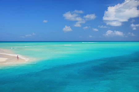 Sandy beach at the tip of Mouli Island in Ouvea lagoon, Loyalty Islands, New Caledonia. The lagoon was listed as Unesco World Heritage site in 2008.の写真素材