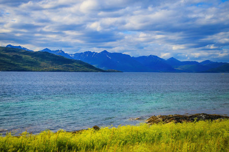 Coastline along Gullesfjord on Hinnoya Island, Vesteralen archipelago, Northern Norway. Hinnoya is...