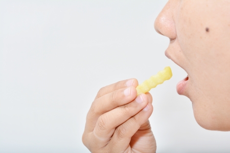 Eating deep-friesの写真素材