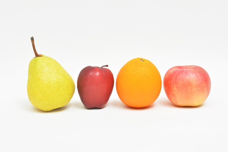 Four healthy fruit with different shape and colourの写真素材