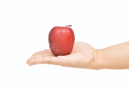 one apple on the palm with the right hand の写真素材