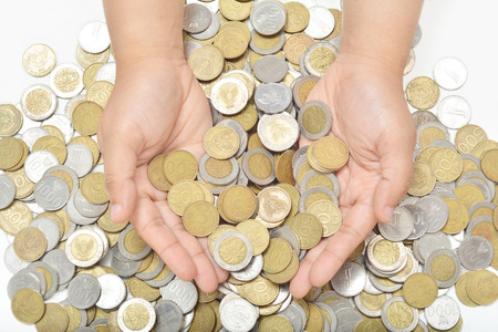 Hand gesture for scooping up coins from the pile.