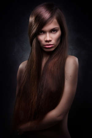 attractive young woman with long hairの写真素材