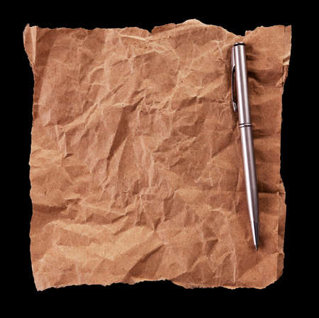 crumpled sheet of paper and a penの写真素材