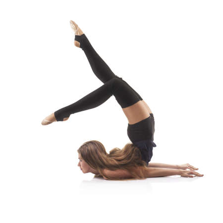 cute woman gymnast on white background