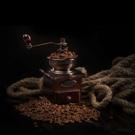 Coffee beans with coffee millの写真素材