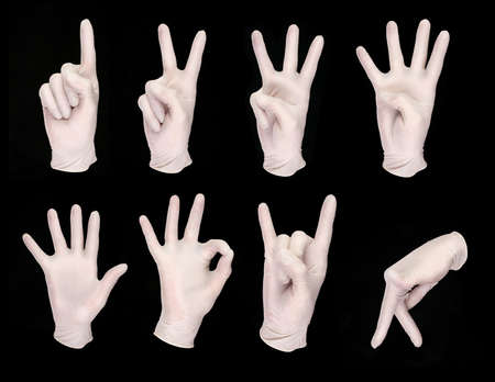 set of human hands in white glovesの写真素材