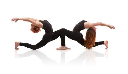 paired yoga on a white backgroundの写真素材