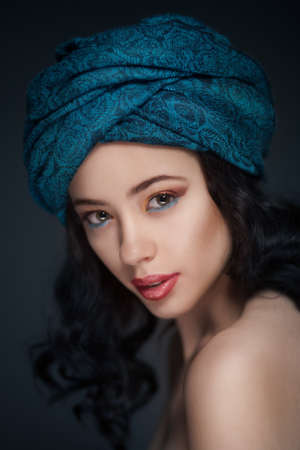 Portrait of a beautiful woman in turbanの写真素材