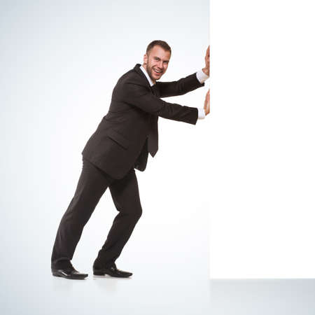 Businessman pushing away somethingの写真素材