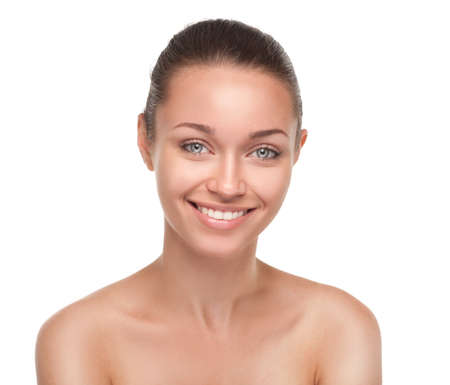 Young smiling woman with beautiful healthy faceの写真素材