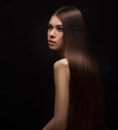 Beautiful Brunette Girl with Healthy Long Hair  の写真素材