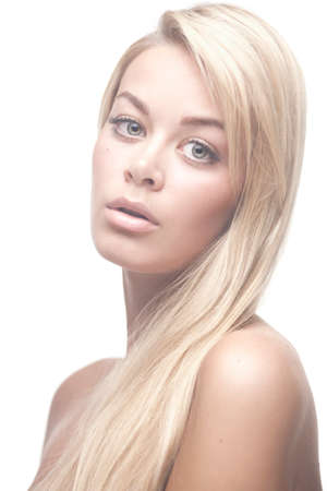 Portrait of a stunning blonde beauty on white backgroundの写真素材