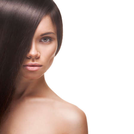 Beautiful Woman with Straight Long Hair isolated on white backgroundの写真素材