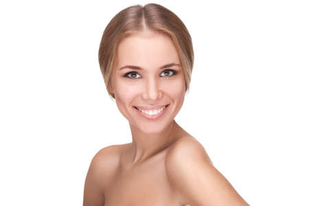 Young smiling woman with beautiful healthy face isolated on white backgroundの写真素材