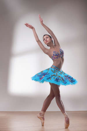 beautiful woman ballet dancer isolated on white backgroundの写真素材