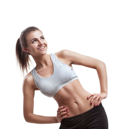 Athletic young woman isolated over white backgroundの写真素材