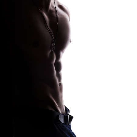 closeup of strong athletic man isolated on white backgroundの写真素材