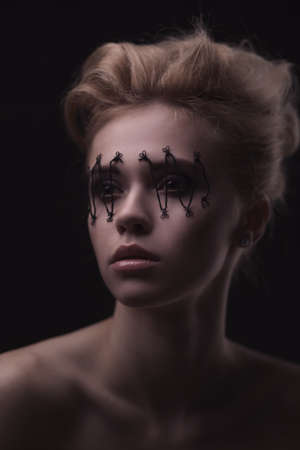 Close-up of beautiful woman face with Creative Fashion Art make upの写真素材