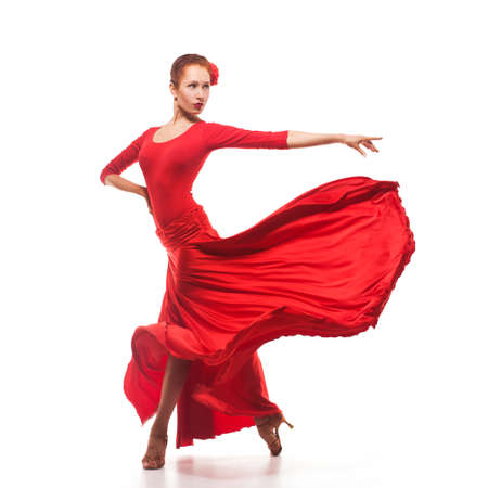 woman traditional dancer wearing red dress isolated on white backgroundの写真素材