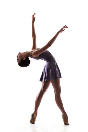 beautiful woman ballet dancer isolated on white backgroundの写真素材
