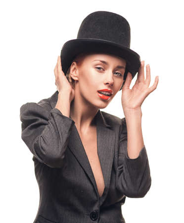 Beautiful woman in hat isolated over white background. Retro fashion.