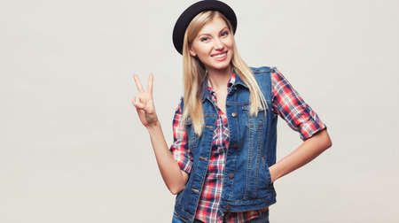 Closeup studio portrait of hipster young womanの写真素材