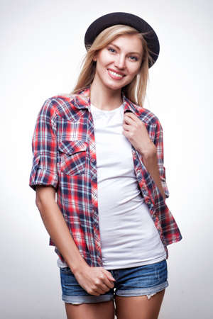 Closeup studio portrait of hipster young womanの写真素材