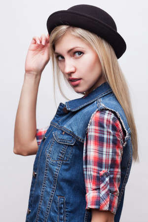 Closeup studio portrait of hipster young womanの写真素材