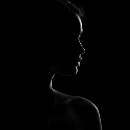 silhouette of beautiful young womanの写真素材
