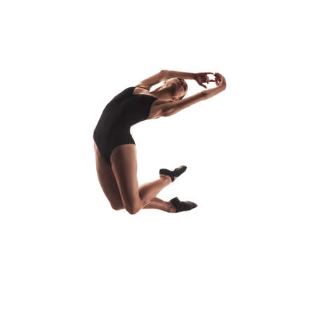 Ballerina in black outfit jumpimg