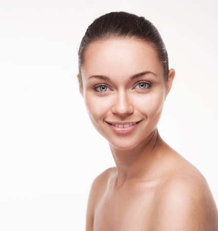 closeup portrait of beautyful smiling woman with clean fresh skinの写真素材