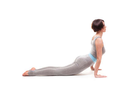 young beautiful woman yoga posingの写真素材