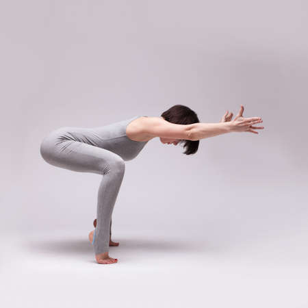 young beautiful woman yoga posingの写真素材