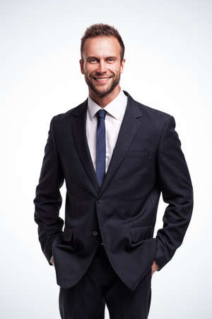 smiling businessman over a white backgroundの写真素材