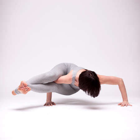 young beautiful woman yoga posingの写真素材