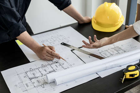 The architects and engineers are meeting to discuss building plans, big projects that can be auctioned. Interior design and decoration ideas.の写真素材