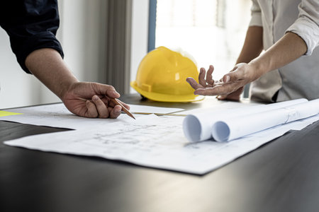 The architects and engineers are meeting to discuss building plans, big projects that can be auctioned. Interior design and decoration ideas.の写真素材