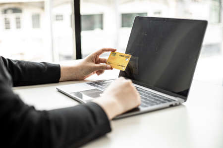 The concept of using credit card to pay for goods or services on online websites, online shopping by credit card, full card information on the website can pay for goods and services.の写真素材