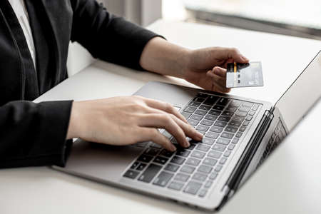 The concept of using credit card to pay for goods or services on online websites, online shopping by credit card, full card information on the website can pay for goods and services.の写真素材