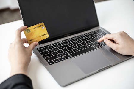 The concept of using credit card to pay for goods or services on online websites, online shopping by credit card, full card information on the website can pay for goods and services.の写真素材