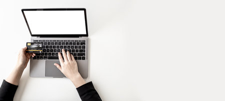 The concept of using credit cards to pay for goods or services on online websites, online shopping by credit card. Concept of using a credit card. Panorama banner background with copy space.の写真素材