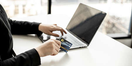 The concept of using credit card to pay for goods or services on online websites, online shopping by credit card, full card information on the website can pay for goods and services.の写真素材