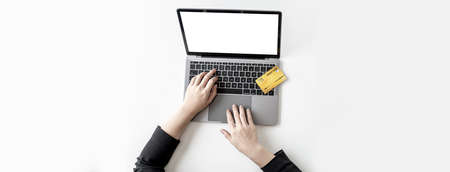 The concept of using credit cards to pay for goods or services on online websites, online shopping by credit card. Concept of using a credit card. Panorama banner background with copy space.の写真素材