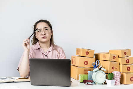 Online shop owners are using ideas to make marketing plans to be able to sell many products and are outstanding than other stores in the market. Online sales concepts and online marketing.の写真素材