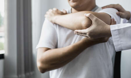 A professional physiotherapist is doing stretching for a patient, the patient has muscle dysfunction...