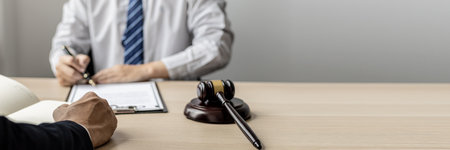 Attorneys or lawyers are advising clients in defamation cases, they are collecting evidence to bring charges against the parties for damages. The concept of defamation case counseling.の写真素材