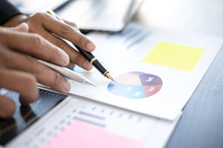 A meeting between two partners on corporate finance and together brainstorming for the company to...